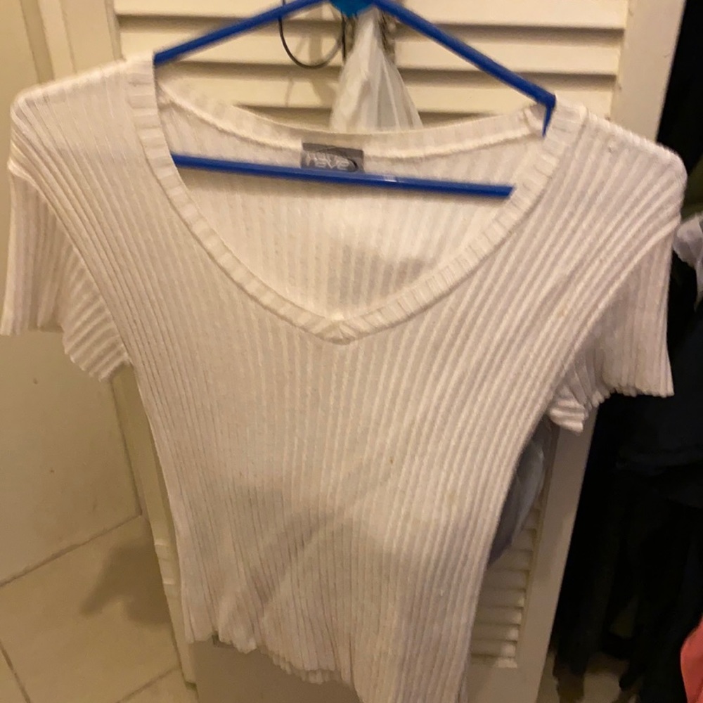 V-neck ribbed sweater. Comfortable can be worn casual or for dress